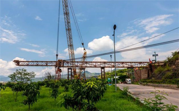 中国能建：2台30吨国内最高最大跨度辐射式缆机成功拆除！